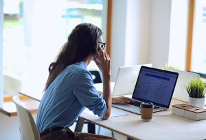 woman at computer interviewing pasadena web design studio